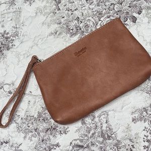 Roots suede wristlet